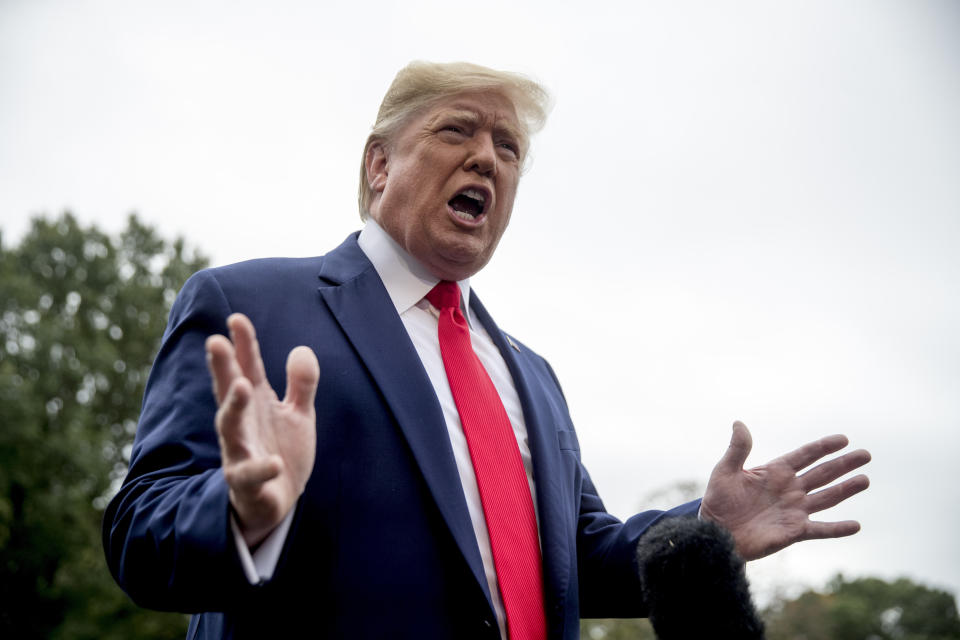 President Trump speaks to the media on Oct. 3, before leaving for Florida. (Photo: AP/Andrew Harnik)