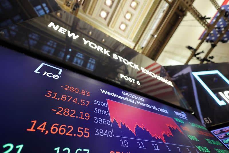 Traders work on the floor of the New York Stock Exchange (NYSE) in New York City