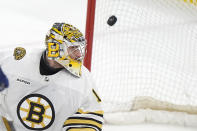 Boston Bruins goaltender Jeremy Swayman looks back as a shot from Florida Panthers center Sam Reinhart (not shown) goes into the goal during the second period of Game 5 of the second-round series of the Stanley Cup Playoffs, Tuesday, May 14, 2024, in Sunrise, Fla. (AP Photo/Wilfredo Lee)