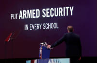 <p>NRA Executive Vice President and CEO Wayne LaPierre watches an NRA promotional video while speaking at the Conservative Political Action Conference (CPAC) at National Harbor, Md., Feb. 22, 2018. (Photo: Kevin Lamarque/Reuters) </p>