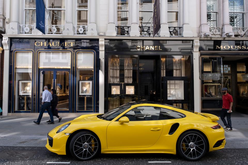 Porsche 911 car parked outside Chanel on London's Bond Street.