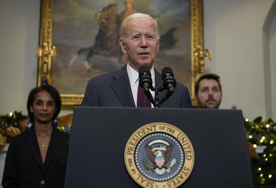 Flanked by Chair of the Council of Economic Advisers Cecilia Rouse (L) and Director of the National Economic Council Brian Deese (R), U.S. President Joe Biden speaks in the Roosevelt Room of the White House December 13, 2022 in Washington, DC. (Photo by Drew Angerer/Getty Images)