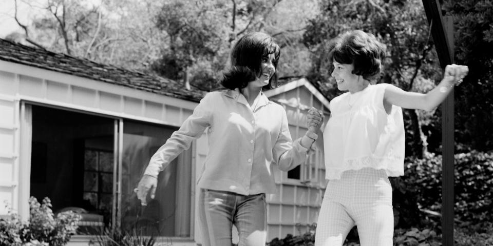 Natalie Wood and Lana wood pose for a photo.