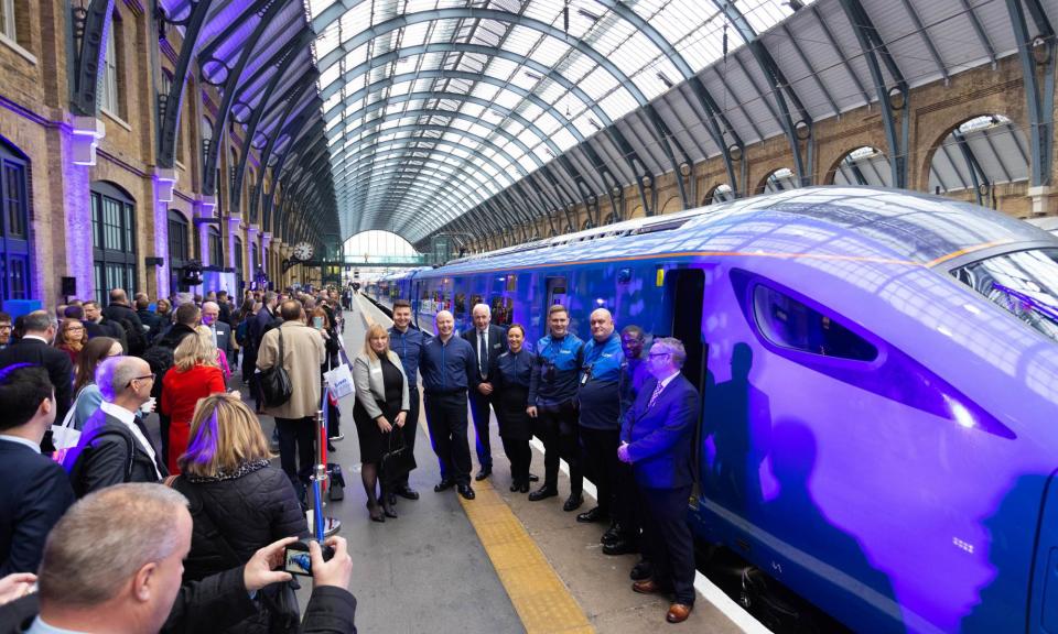 <span>Lumo launches its London-Edinburgh service at King’s Cross station in 2021.</span><span>Photograph: David Parry/PA</span>