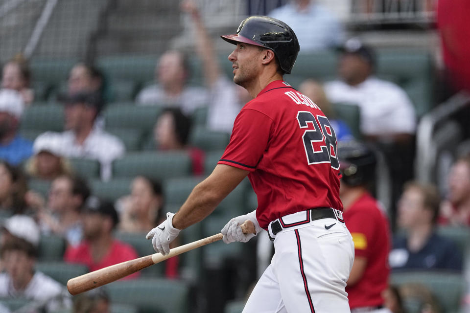 Atlanta Braves' Matt Olson watches his grand slam in the first inning of a baseball game against the Chicago White Sox, Friday, July 14, 2023, in Atlanta. (AP Photo/John Bazemore)
