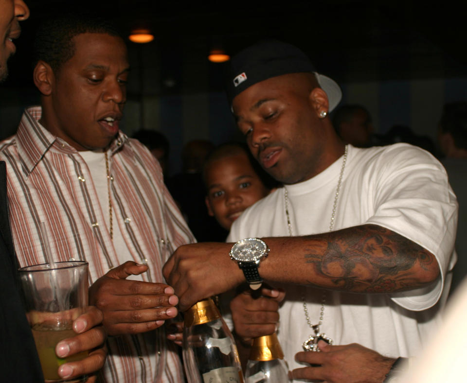 Jay-Z and Damon Dash during Damon Dash’s Birthday Party – May 4, 2004 at La Bodega in New York City, New York, United States. (Photo by Johnny Nunez/WireImage)