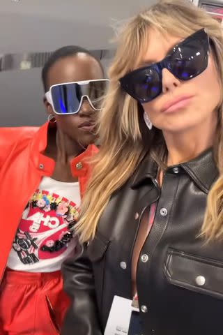 <p>Heidi Klum/Instagram</p> Lupita Nyong'o and Heidi Klum at the Las Vegas Grand Prix.