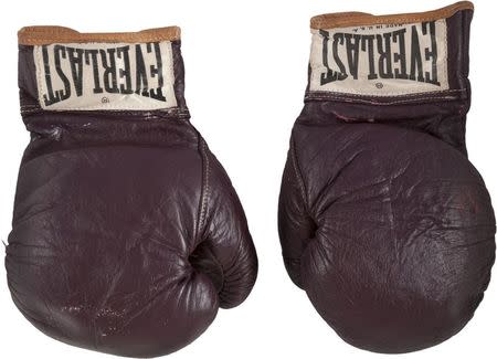 The 1971 Muhammad Ali gloves from his first Joe Frazier bout are pictured in this undated handout photo courtesy of Heritage Auctions received July 31, 2014. REUTERS/Heritage Auctions/Handout via Reuters