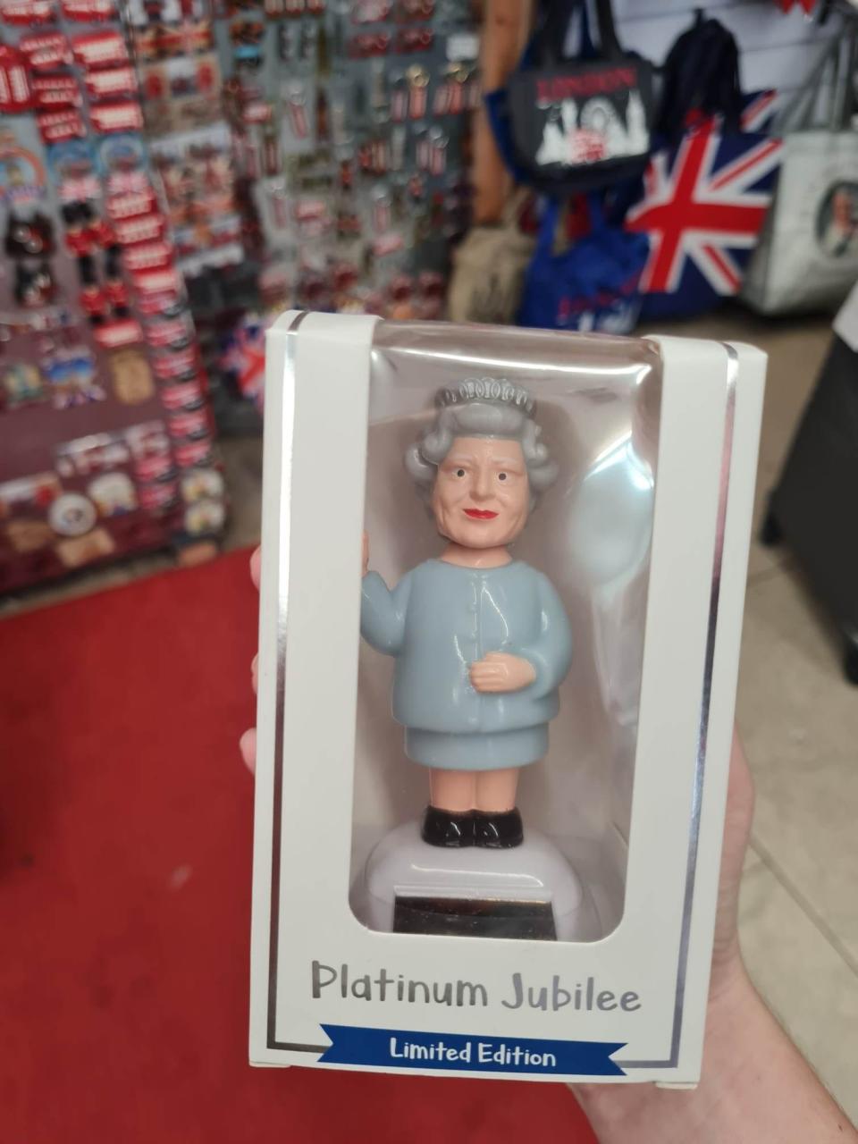 A figurine of Queen Elizabeth II at a tourist store in Kensington, London.