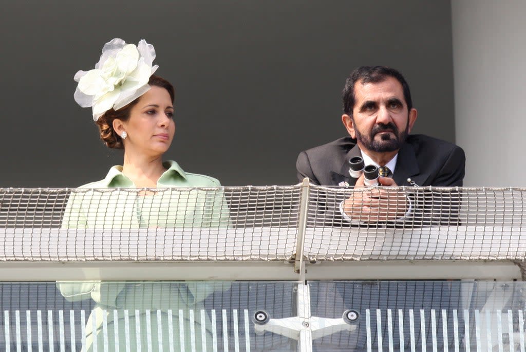 Sheikh Mohammed Bin Rashid Al Maktoum and Princess Haya Bint Al Hussein in the stands at Epsom in 2011 (PA) (PA Wire)