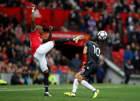 Soccer Football - Premier League - Manchester United vs Crystal Palace - Old Trafford, Manchester, Britain - September 30, 2017 Manchester United's Ashley Young in action with Crystal Palace's Andros Townsend REUTERS/Andrew Yates