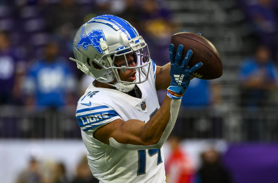 MINNEAPOLIS, MN - SEPTEMBER 25: Amon-Ra St. Brown #14 of the Detroit Lions warms up before the game against the Minnesota Vikings at U.S. Bank Stadium on September 25, 2022 in Minneapolis, Minnesota. (Photo by Stephen Maturen/Getty Images)