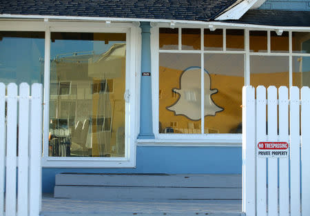 A former office building of Snap Inc. still remains with its logo on the wall in Venice Beach, California, U.S., March 1, 2017. REUTERS/Mike Blake