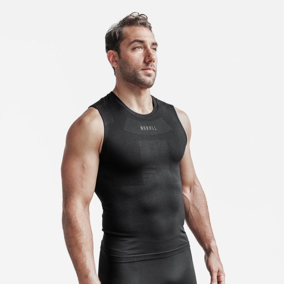 <p><a href="https://go.redirectingat.com?id=74968X1596630&url=https%3A%2F%2Fwww.nobullproject.com%2Fproducts%2Fmens-midweight-seamless-compression-sleeveless-top-black%3Fvariant%3D42928582328510%26_rchcur%3DUSD%26gclid%3DEAIaIQobChMIz76t29WtgQMVsh59Ch3mGQsoEAQYBiABEgIlA_D_BwE&sref=https%3A%2F%2Fwww.menshealth.com%2Ffitness%2Fg26966650%2Fbest-compression-shirts%2F" rel="nofollow noopener" target="_blank" data-ylk="slk:Shop Now;elm:context_link;itc:0;sec:content-canvas" class="link ">Shop Now</a></p><p>Men's Midweight Seamless Compression Sleeveless Top</p><p>nobullproject.com</p><p>$52.00</p>