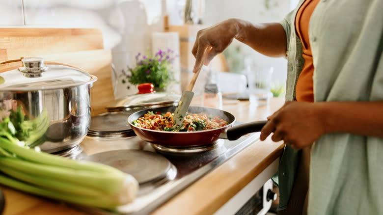 Home cook making stir-fry