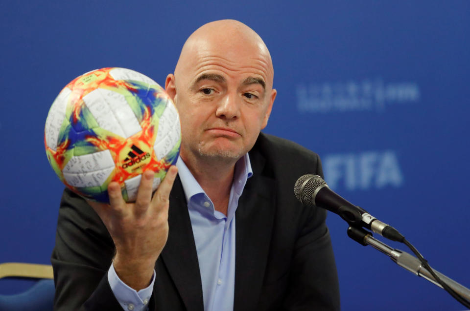 FIFA President Gianni Infantino shows an official ball of the 2019 FIFA Women's World Cup during his news conference in Rome, Italy, February 27, 2019.   REUTERS/Remo Casilli