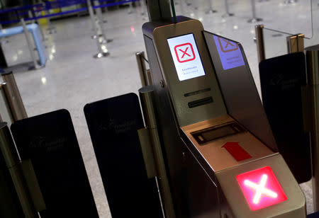 Closed security check points are photographed during a strike over higher wages at Germany's largest airport in Frankfurt, Germany, January 15, 2019. REUTERS/Kai Pfaffenbach