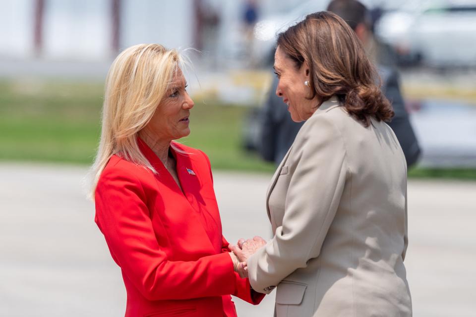 Upon her arrival at Jacksonville International Airport, Vice President Kamala Harris, right, meets with Jacksonville's newly-elected Mayor Donna Deegan on the Tarmac before Harris's motorcade departs for the Ritz Theatre and Museum.