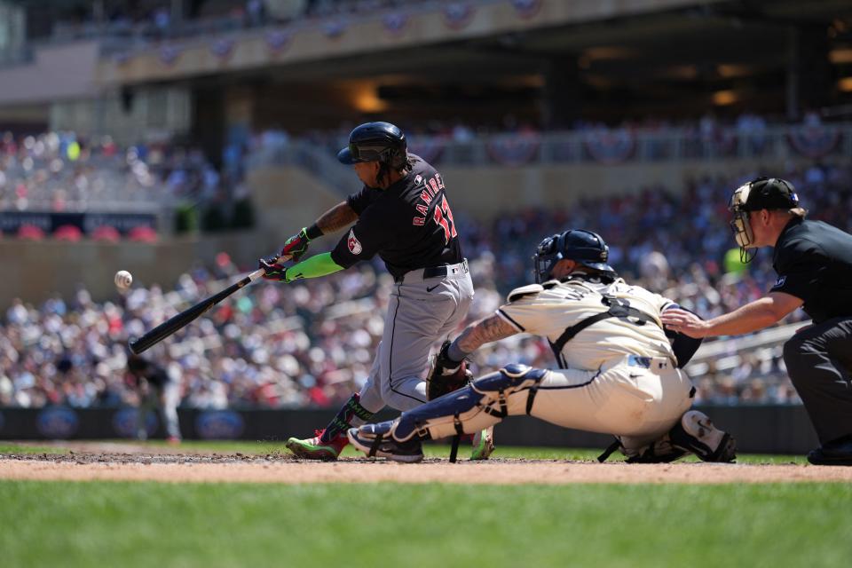 Aug 11, 2024; Minneapolis, Minnesota, USA; Cleveland Guardians third baseman Jose Ramirez (11) hits a solo home run during the fourth inning against the Minnesota Twins at Target Field. Mandatory Credit: Jordan Johnson-USA TODAY Sports