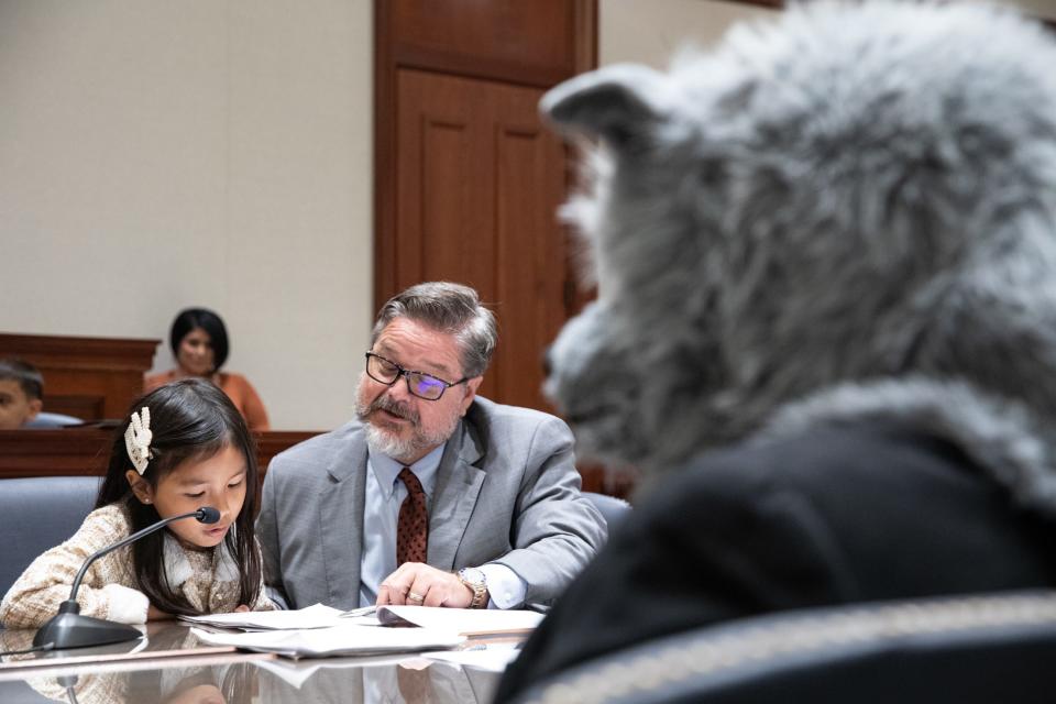 Craig Henderson, assisting with The Big Bad Wolf's defense team, helps Flour Bluff student Brianna Meng with her arguments during a mock trial at the Federal Courthouse on Thursday, Nov. 16, 2023, in Corpus Christi, Texas.