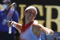 Jessica Pegula of the U.S. celebrates after defeating Maria Sakkari of Greece in their fourth round match at the Australian Open tennis championships in Melbourne, Australia, Sunday, Jan. 23, 2022. (AP Photo/Tertius Pickard)