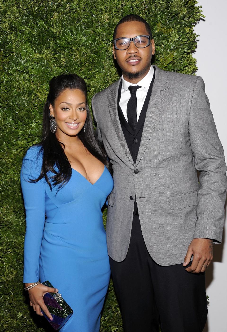 FILE - In this Nov. 14, 2011 file photo, LaLa Anthony, left and husband Carmelo Anthony attend the CFDA / Vogue Fashion Fund Awards at Skylight Soho in New York. Tall, trim and wearing catwalk clothes: Pro basketball stars have stepped up their style to become influential tastemakers. .Pro player style has been on the upswing for the past decade, especially since the NBA initiated a dress code in 2005, according to observers. (AP Photo/Evan Agostini, file)