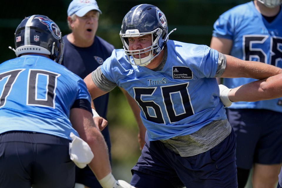 Tennessee Titans offensive lineman Daniel Brunskill (60) runs through a drill during NFL football practice Thursday, June 6, 2024, in Nashville, Tenn. (AP Photo/George Walker IV)