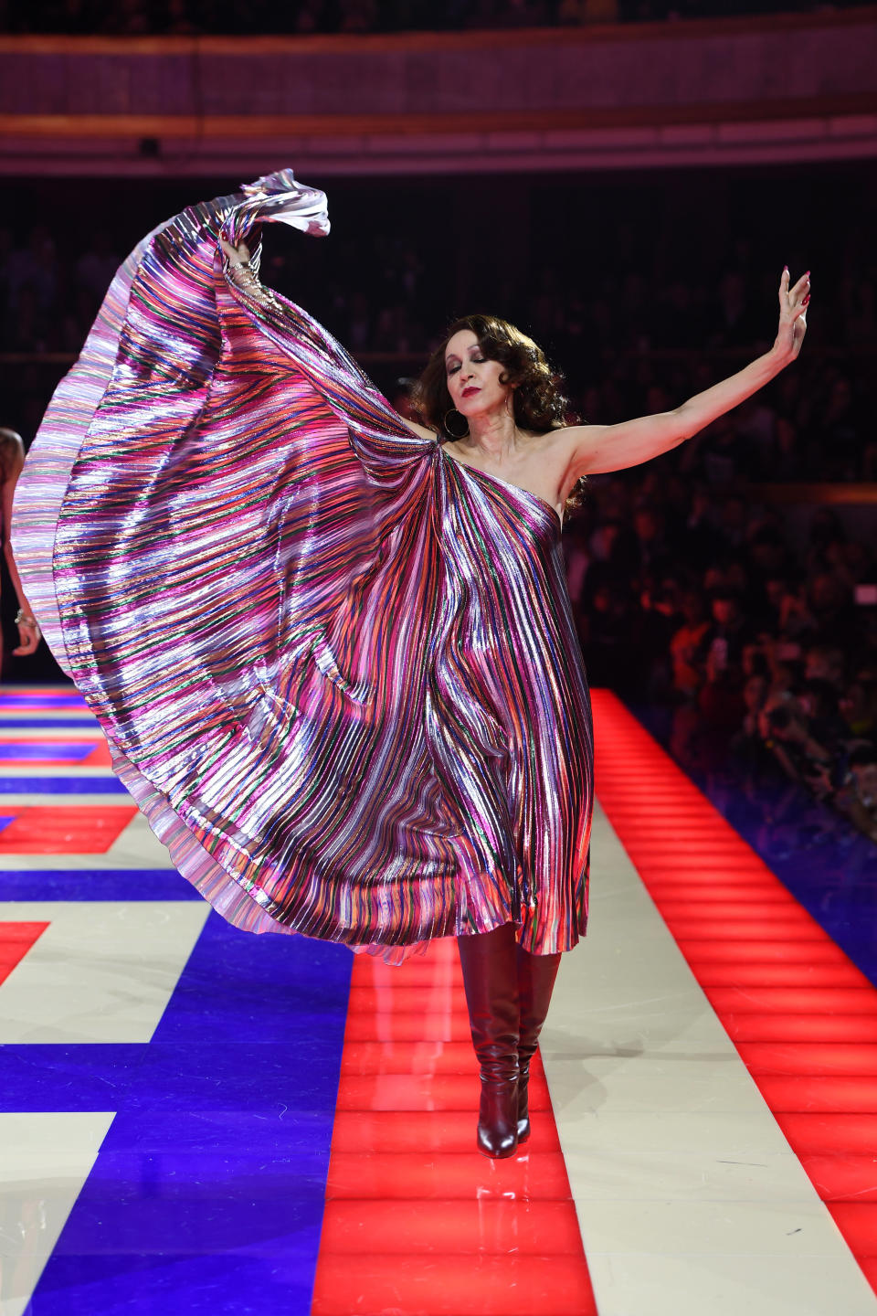 Pat Cleveland struts her stuff on the Tommy x Zendaya runway. (Photo: Ian Gavan via Getty Images)