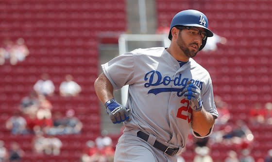 Los Angeles Dodgers' Rob Segedin runs the bases after hitting a solo home run off Cincinnati Reds relief pitcher Josh Smith in the fifth inning of a baseball game, Monday, Aug. 22, 2016, in Cincinnati. (AP Photo/John Minchillo)