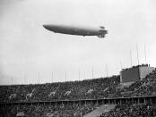 <p>The German airship Hindenburg flies over the Olympic Stadium, outside Berlin, on August 1, 1936, during the opening ceremony of the Olympic Games. (AP Photo) </p>