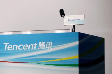 FILE PHOTO: Logos of Tencent are displayed at a news conference in Hong Kong, China March 22, 2017. REUTERS/Tyrone Siu/File Photo