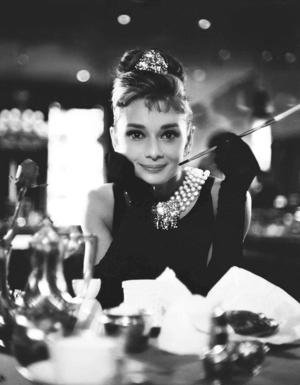 Audrey Hepburn on the set of Breakfast at Tiffany&#39;s, wearing opera gloves