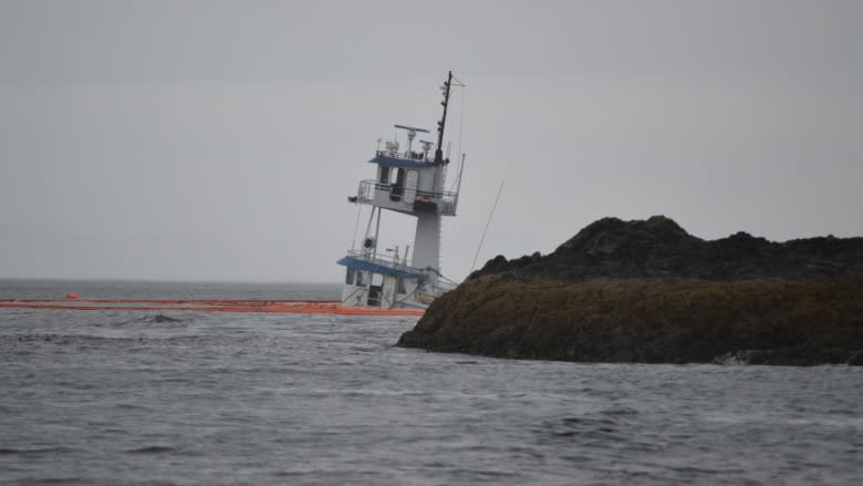 Coast Guard chief defends response to sunken tug in B.C.