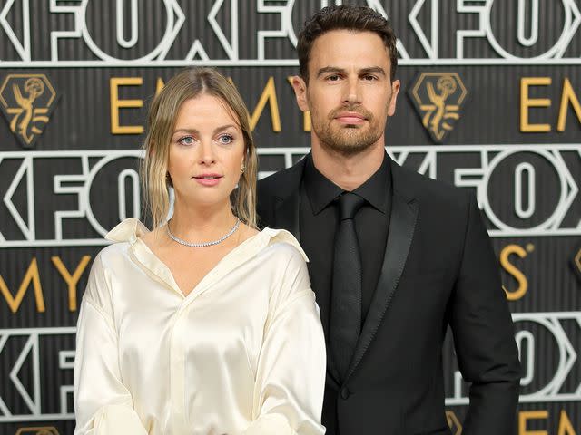 <p>Neilson Barnard/Getty</p> Theo James and wife Ruth Kearney