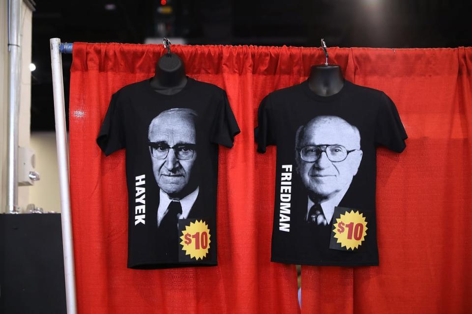<div class="inline-image__caption"><p>Shirts with the images of Friedrich Hayek, left, and Milton Friedman on sale inside the Conservative Political Action Conference Hub on Feb. 23, 2018 in National Harbor, Maryland.</p></div> <div class="inline-image__credit">Chip Somodevilla/Getty Images</div>