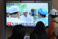 A TV screen shows a file image of North Korean leader Kim Jong Un, center, during a news program at the Seoul Railway Station in Seoul, South Korea, Monday, May 29, 2023. Japan's coast guard said North Korea has notified it that it plans to launch a satellite in coming days. (AP Photo/Ahn Young-joon)