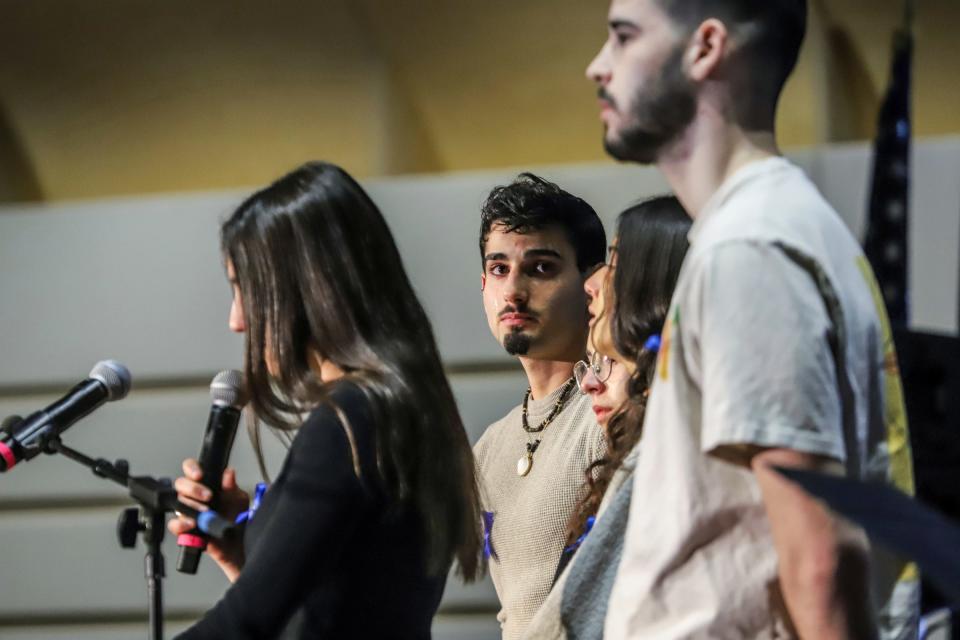 Itamar Grife, of the Shinshinim, looks on with tears in his eyes as they read the names of hostages taken by Hamas during the Jewish community gathering at Adat Shalom Synagogue in Farmington Hills on Tuesday, Nov. 7, 2023.