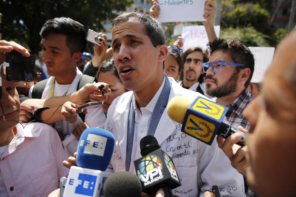 National Assembly President Juan Guaid&oacute;, center, has declared himself interim president of Venezuela. President Donald Trump and some Democrats have agreed to recognize him.&nbsp; (Photo: ASSOCIATED PRESS/Ariana Cubillos)