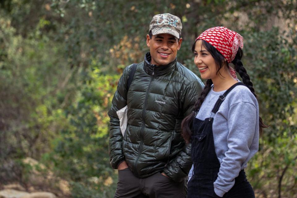 Usal Project founder Michael Washington stands with naturalist Andrea Jimenez during a nature walk.