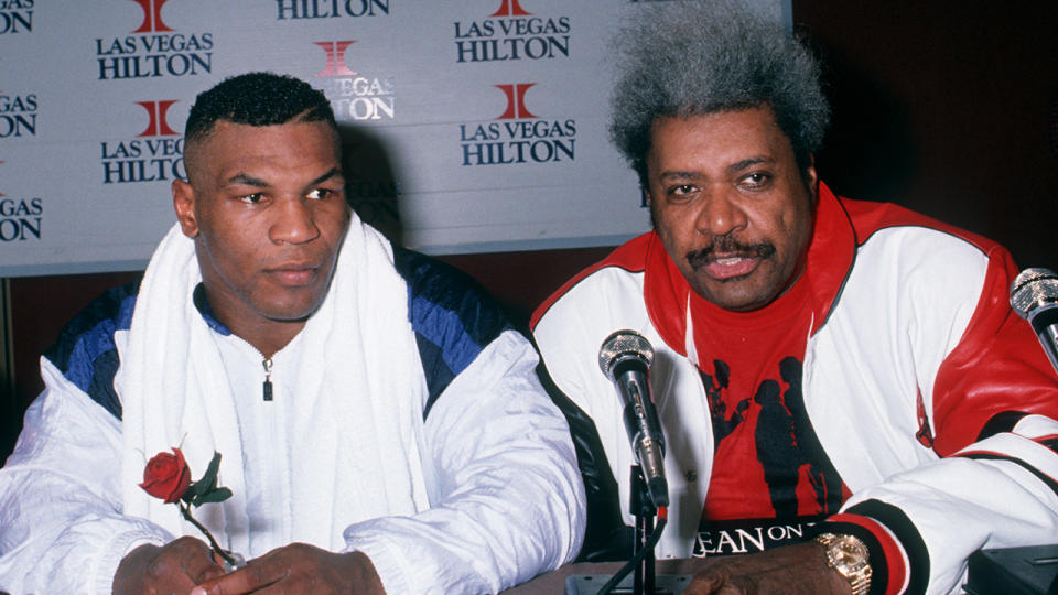 Tyson (left) and King appear at a press conference during happier times. Pic: Getty