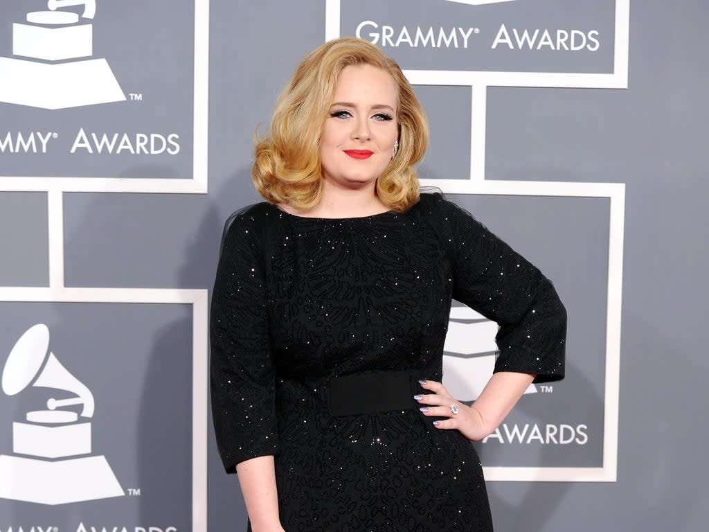 Adele opens up about postpartum depression and motherhood (Getty Images)