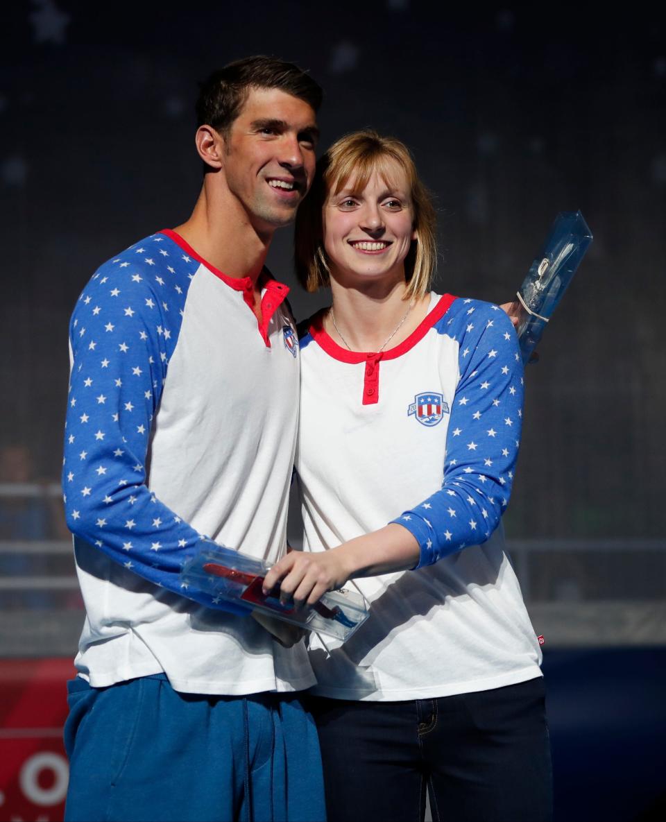 Ledecky posts for a photo with Michael Phelps at the 2016 U.S. Olympic swimming trials.