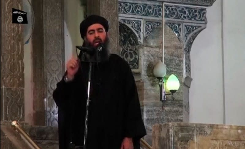 FILE PHOTO: Still image taken from video of a man purported to be the reclusive leader of the militant Islamic State Abu Bakr al-Baghdadi making what would be his first public appearance at a mosque in Mosul