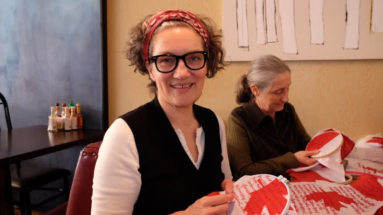 Winnipeg artist sews TRC's calls to action into Canadian flags