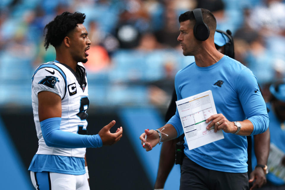 CHARLOTTE, NORTH CAROLINA - SEPTEMBER 15: Quarterback Bryce Young #9 talks with head coach Dave Canales of the Carolina Panthers talks with at Bank of America Stadium on September 15, 2024 in Charlotte, North Carolina. (Photo by Jared C. Tilton/Getty Images)