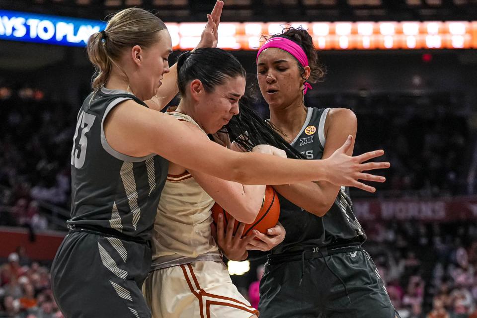 Texas Longhorns guard Shaylee Gonzales (2) fights for control of the ball during the basketball game against Iowa State at the Moody Center on Saturday, Feb. 17, 2024 in Austin.