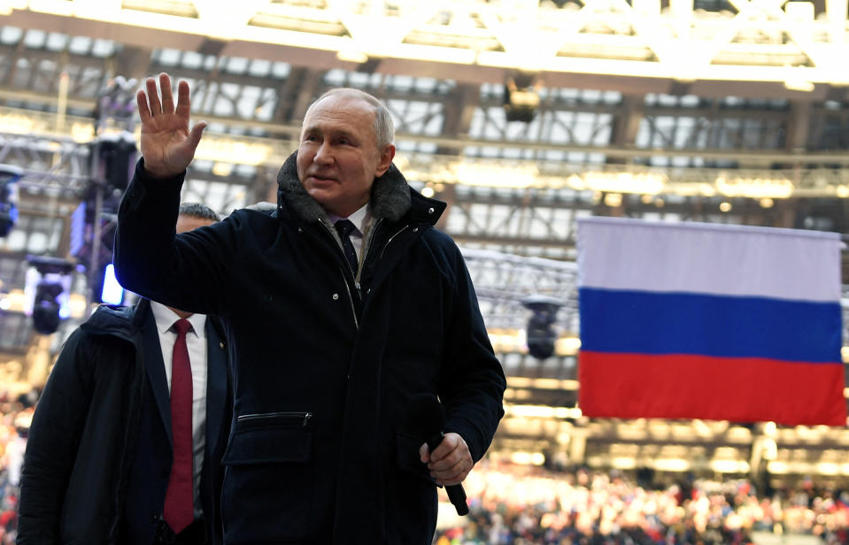 Russian President Vladimir Putin attends a concert dedicated to Russian service members involved in the country's military campaign in Ukraine, on the eve of the Defender of the Fatherland Day at Luzhniki Stadium in Moscow, Russia February 22, 2023. Sputnik/Maksim Blinov/Kremlin via REUTERS ATTENTION EDITORS - THIS IMAGE WAS PROVIDED BY A THIRD PARTY.