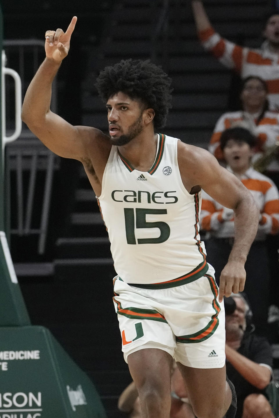 Miami forward Norchad Omier (15) gestures after dunking the ball during the first half of an NCAA college basketball game against Virginia Tech, Tuesday, Jan. 31, 2023, in Coral Gables, Fla. (AP Photo/Marta Lavandier)