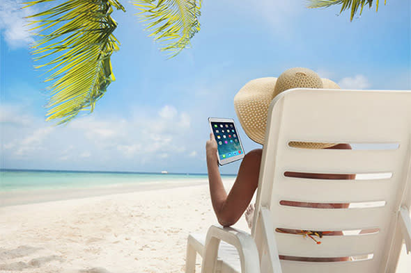 Relax on the beach and tablet computer