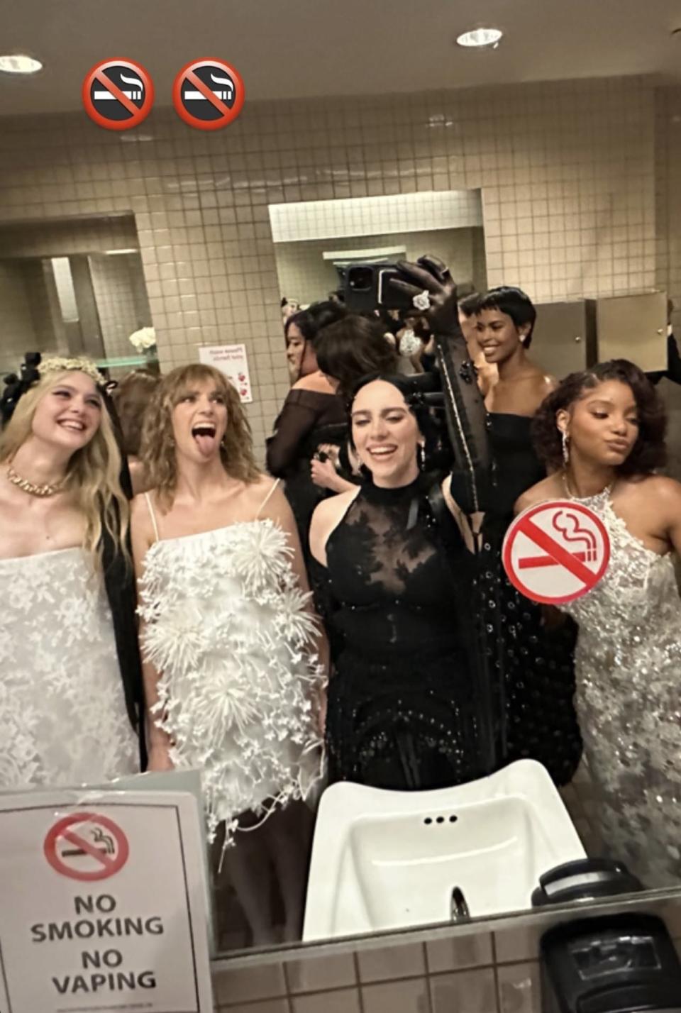 Celebrities taking selfies in the bathroom